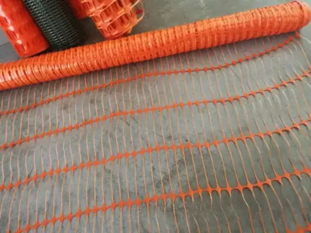 Orange barrier netting fence by HIPHEN