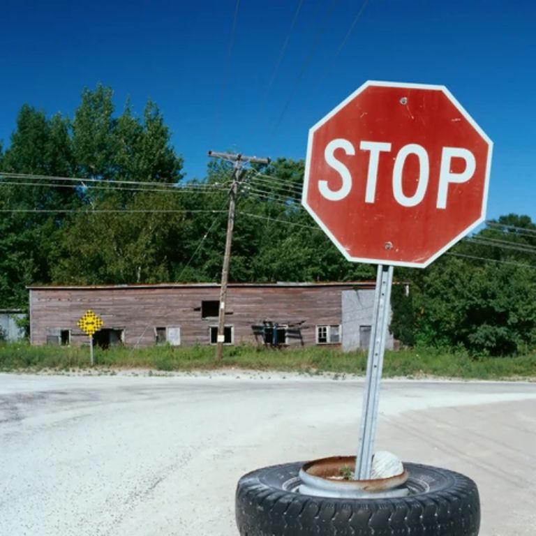Slow down sign by HIPHEN