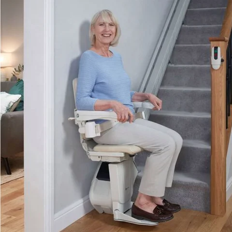 Twin rail curved stair elevator by Home Lift Elevator