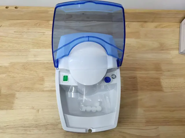 Handheld medical nebulizer machine by Scantrik